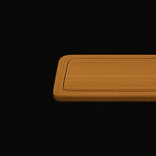Wooden cutting board on a black background
