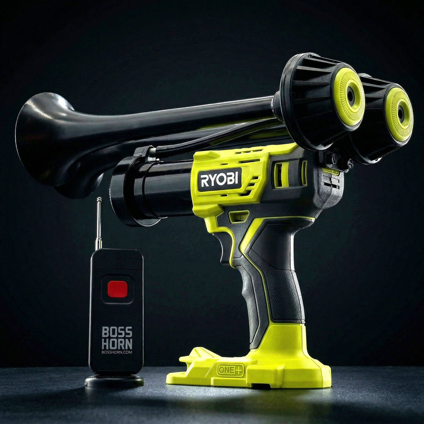 Black dual-trumpet wildlife deterrent camp horn with wireless remote on a dark background