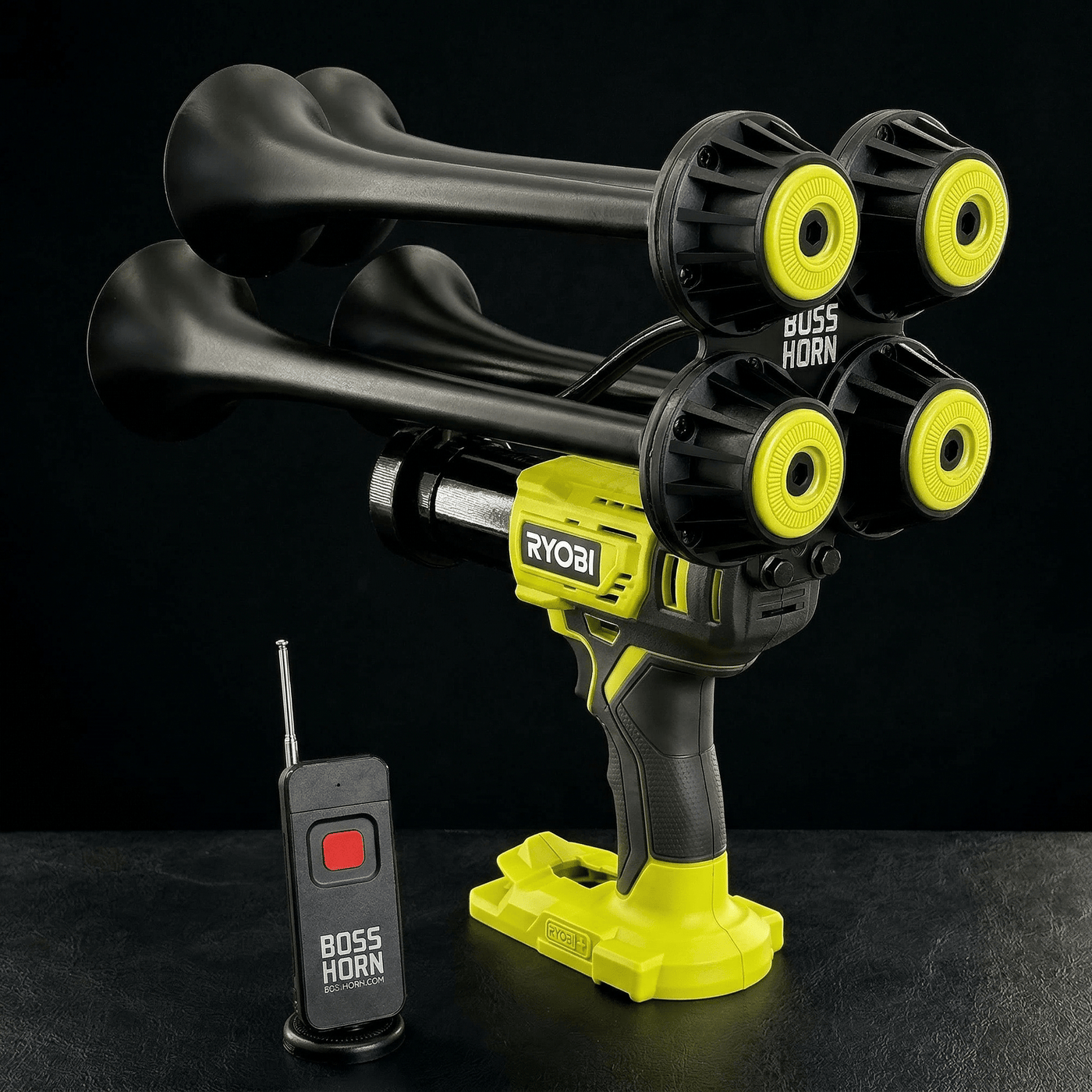 Black four-trumpet wildlife deterrent camp horn with wireless remote on a dark background