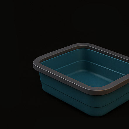 Blue plastic container with gray lid on a black background