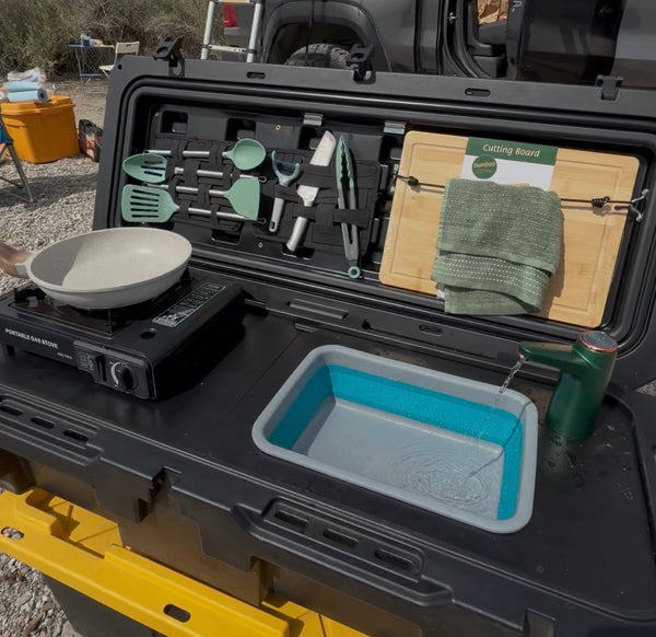 Camp kitchen checklist — 47 essential items laid out for outdoor cooking