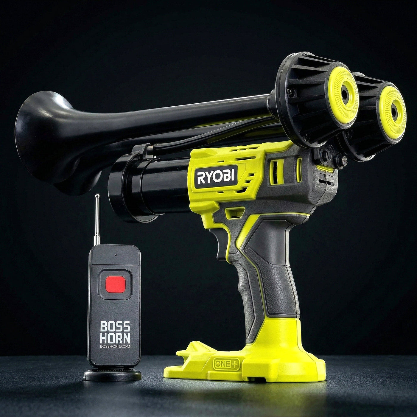 Black dual-trumpet wildlife deterrent camp horn with wireless remote on a dark background